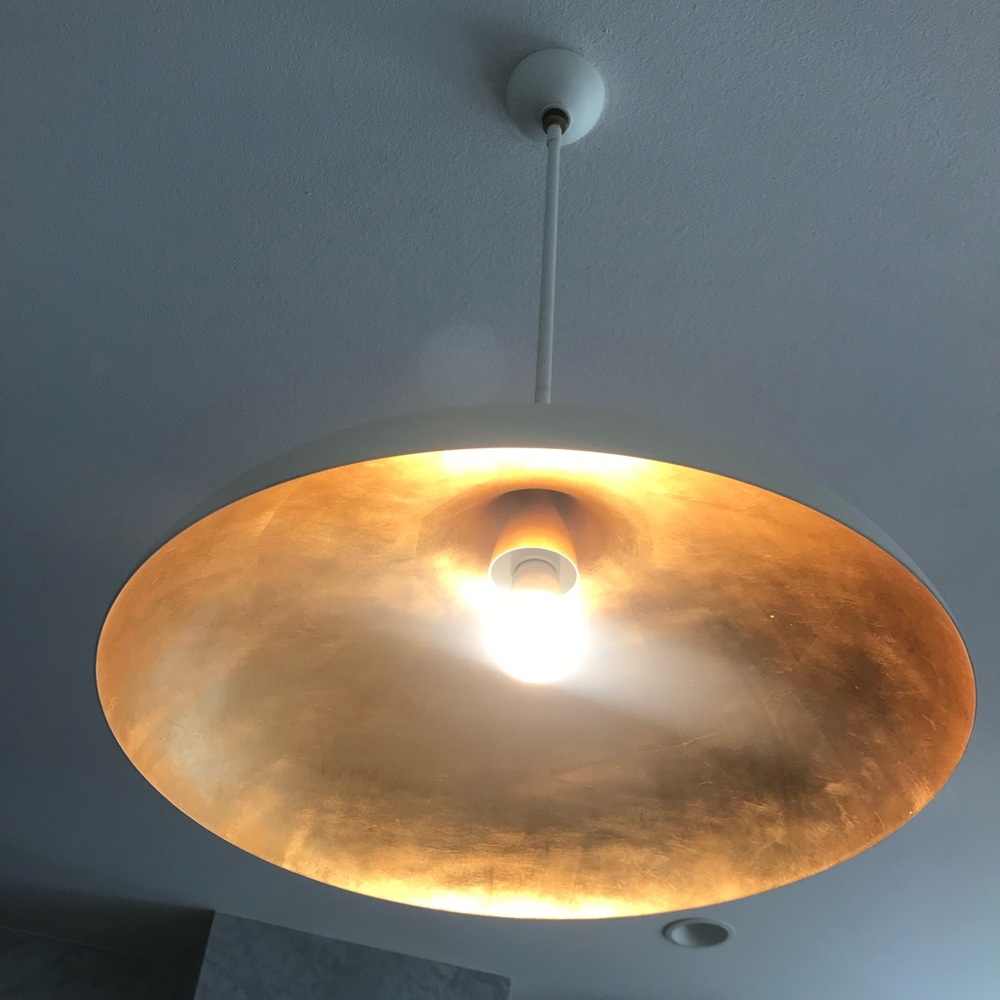 Aerin Agnes pendant lamps in white with gold underneath
